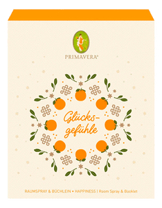 KI generiert: Das Bild zeigt die Verpackung eines Produkts von Primavera, das den Namen "Glücksgefühle" trägt. Es handelt sich um ein Raumspray und Büchlein-Set, dekoriert mit einem Muster aus Orangen und Blättern.