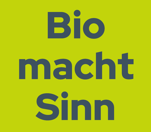 KI generiert: Grüner Hintergrund mit dem Text "Bio macht Sinn".