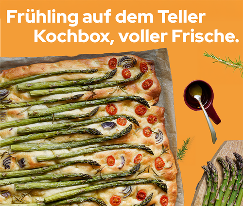 KI generiert: Eine Focaccia mit Spargel und Tomaten. Text: "Frühling auf dem Teller Kochbox, voller Frische."